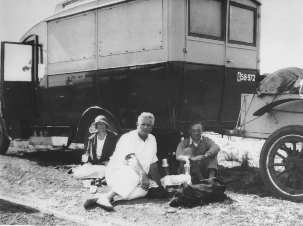 StateLibQld 1 159410 Lunching next to the mobile dental clinic, ca. 1928