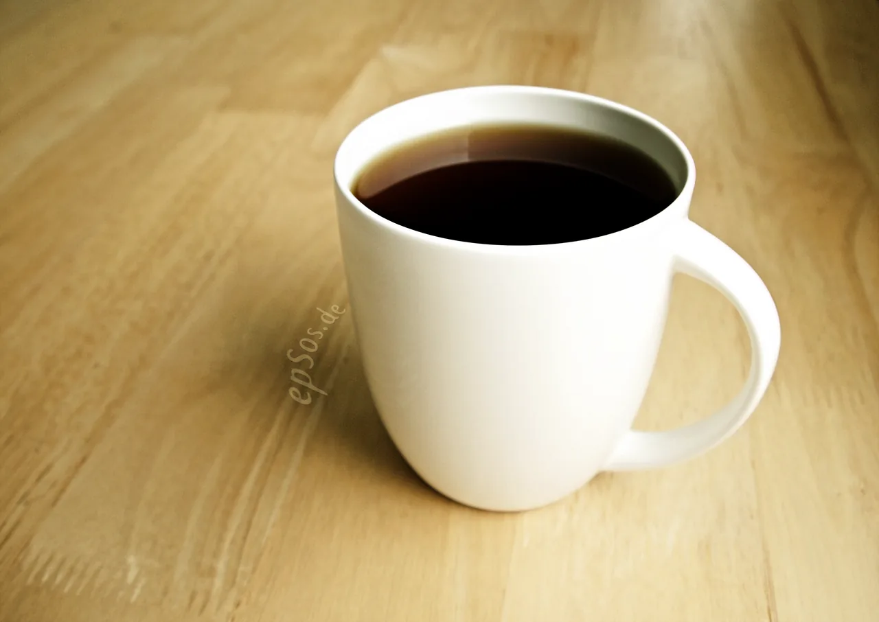 Black Coffee and Tea in White Cup is Hot