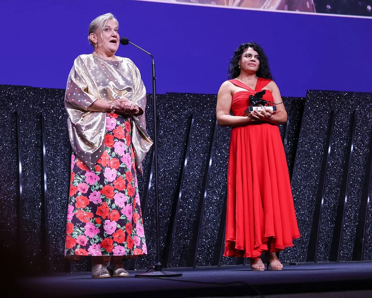 Ada Solomon and Alina Serban with Armani Beauty Audience Award during the closing ceremony of the Venice International F