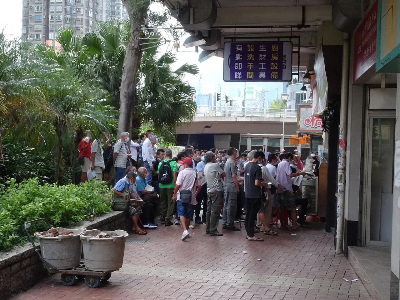 Crowd people are watching television at Tuen Mun